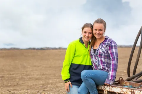 Two young women on a farm